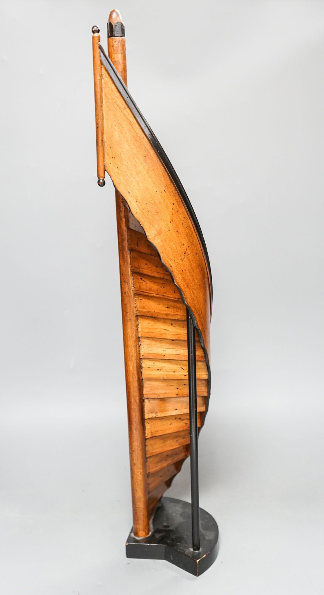 A reproduction fruitwood model spiral staircase 62cm